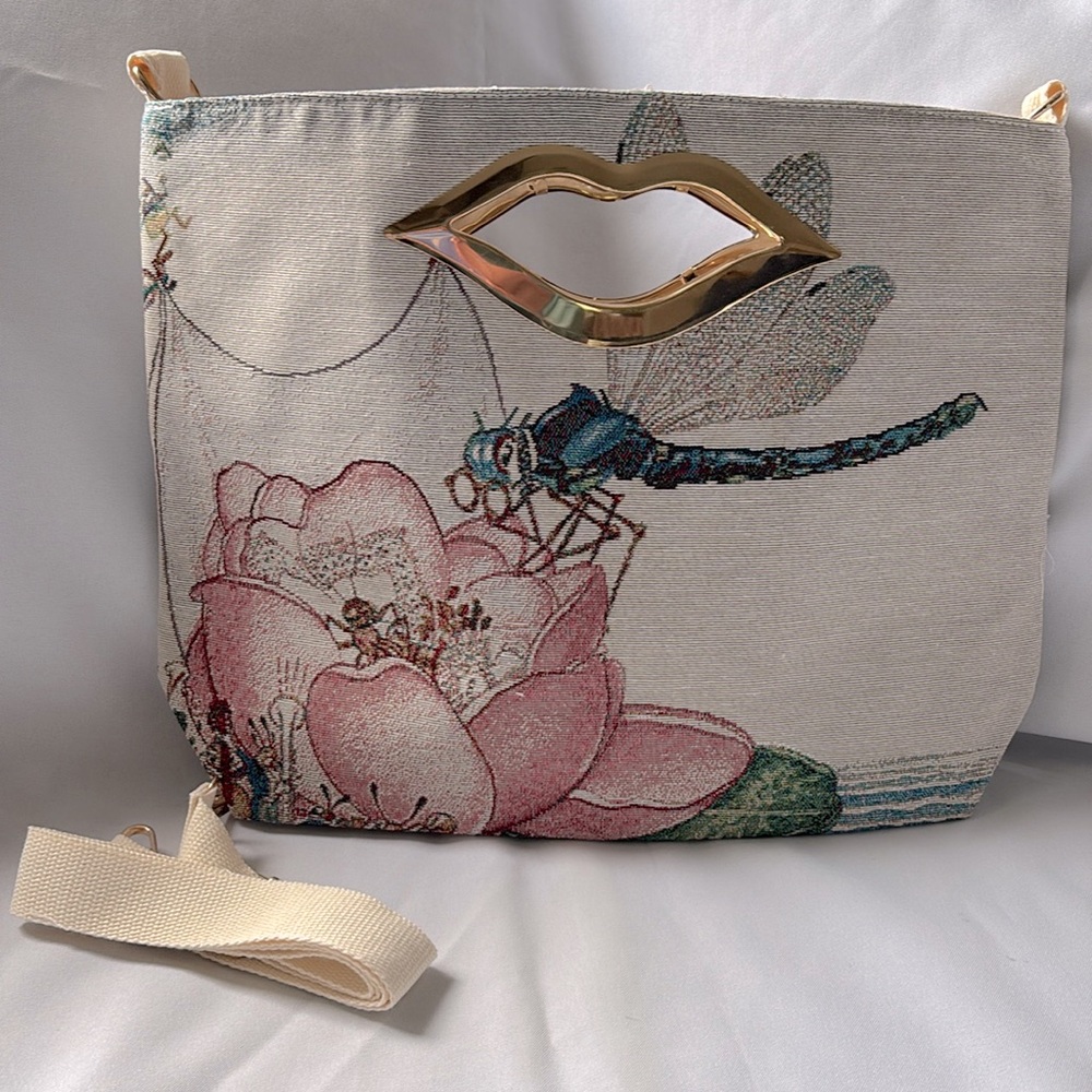 Beige lotus with dragonfly crossbody bag with adjustable shoulder strap